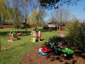 a group of playground equipment in a yard at Coastal Comfort on Poel Island in Insel Poel