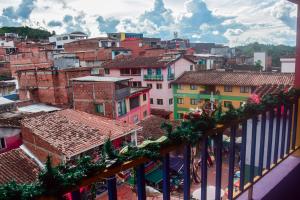 a view of a city from a balcony at Apartamento amoblado en Guatape in Guatapé