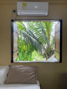Rúm í herbergi á Hotel Gavas Amazonas