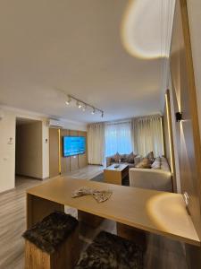 a large living room with a couch and a table at Sheraton Ocean 103 - Without Pool access in Cairo