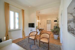 Et tv og/eller underholdning på Villa Chiara class aparthotel