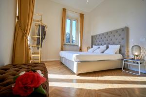 En eller flere senge i et værelse på Villa Chiara class aparthotel + 51 billeder