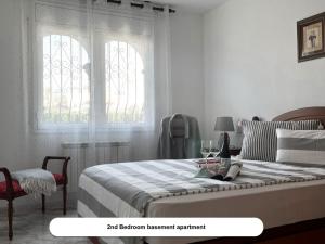 En eller flere senge i et værelse på Poolvilla Michelle in Strandnähe