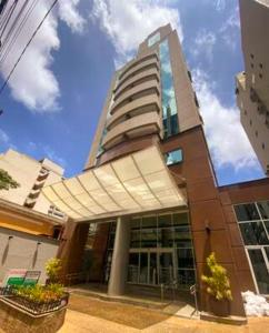 a large building with a tall building at Ao lado da Paulista e metrô lazer completo com estac in Sao Paulo +15 photos