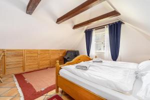 Ένα ή περισσότερα κρεβάτια σε δωμάτιο στο Ferienhaus Urlaubshus