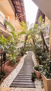 Um jardim em Yes Hotel Pousada mais 37 fotos