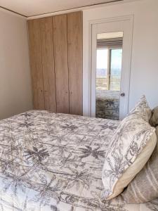 Ένα ή περισσότερα κρεβάτια σε δωμάτιο στο Departamento Macul Américo Vespucio +24 φωτογραφίες