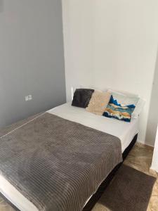 Postel nebo postele na pokoji v ubytování Flats vitoria + 12 fotografií