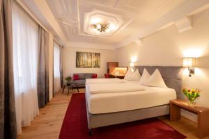 Posteľ alebo postele v izbe v ubytovaní Hotel Mader