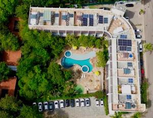 an aerial view of a park with a pool at Prestes Exclusive - Pipa Ubaia in Pipa