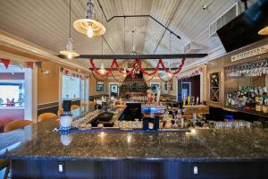 a bar at a restaurant with a counter at Seaport Resort and Marina in Fairhaven