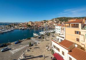 a view of a harbor with boats in the water at Chèz Cocò in La Maddalena +28 photos
