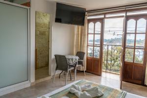 Posezení v ubytování Hotel Portal Guatapé + 37 fotografií