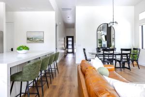 a living room with a couch and a table at Home with Studio near Pine Canyon in Flagstaff +89 photos