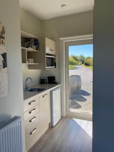 Kuchyň nebo kuchyňský kout v ubytování Clydestay + 10 fotografií