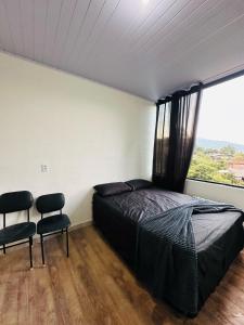 Postel nebo postele na pokoji v ubytování Apto Mobiliado Confortavel, TV Smart - Caieiras