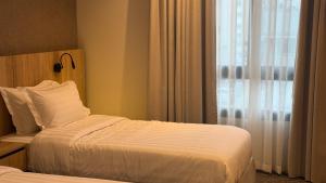 Letto o letti in una camera di فندق آرام النسيم