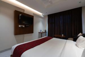 Postel nebo postele na pokoji v ubytování Hotel Vilvah