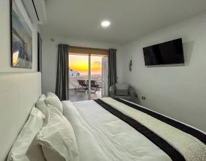 Postel nebo postele na pokoji v ubytování Mirador Balcon del Atlantico y piscina privada