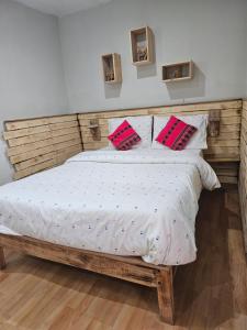 Voodi või voodid majutusasutuse Xplora Hostel Cusco toas