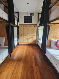 Voodi või voodid majutusasutuse Xplora Hostel Cusco toas