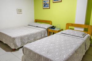 Postel nebo postele na pokoji v ubytování Hotel Veleros Cartagena + 37 fotografií