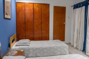 Postel nebo postele na pokoji v ubytování Hotel Veleros Cartagena