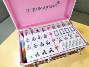 a pink box with a jiuulum playing game at Green Oasis Cottage B in Hakone