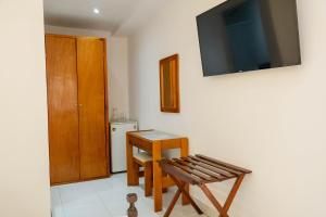 TV a/nebo společenská místnost v ubytování Hotel Veleros Cartagena