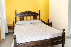 Postel nebo postele na pokoji v ubytování Hotel Veleros Cartagena