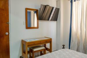 Postel nebo postele na pokoji v ubytování Hotel Veleros Cartagena