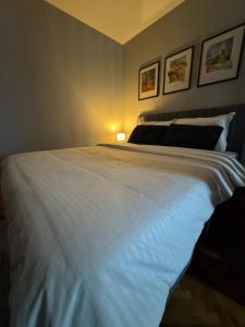 Ένα ή περισσότερα κρεβάτια σε δωμάτιο στο Dici Apartments