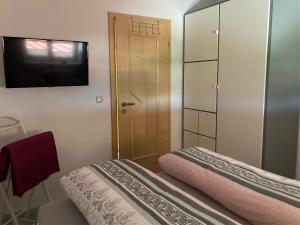Postel nebo postele na pokoji v ubytování Feriennest Chiemseeglück