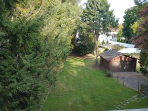 an aerial view of a yard with a shed at 2 Bedroom Unit and Big Yard 30 Minutes to NY in Ridgefield Park