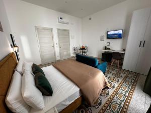 Postel nebo postele na pokoji v ubytování Terra d'amuri Rooms