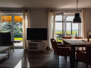TV a/nebo společenská místnost v ubytování Holiday apartment with 3 bedrooms
