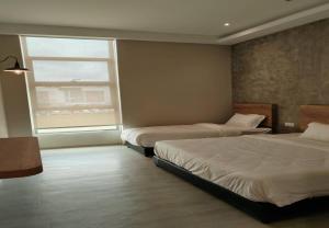 Postel nebo postele na pokoji v ubytování Saradise Point Stay + 23 fotografií