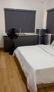 Postel nebo postele na pokoji v ubytování SM service apartment