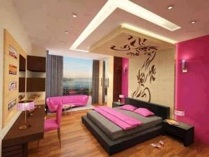 Postel nebo postele na pokoji v ubytování Raam mandir hotel