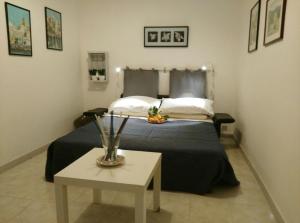 A bed or beds in a room at Noera Home