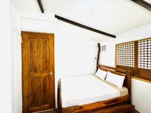 Postel nebo postele na pokoji v ubytování Kubo Royale Private Villa