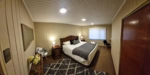 Postel nebo postele na pokoji v ubytování Santa Rosa Hotel boutique