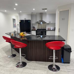 Una cocina o cocineta en Mahzan on Braid Room 2