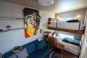 Postel nebo postele na pokoji v ubytování Trailer inn Onomichi