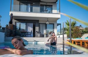 The swimming pool at or close to Aida Luxury Villas