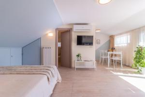 Ένα ή περισσότερα κρεβάτια σε δωμάτιο στο Luxury Maison Dei Colli
