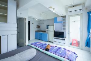 Η κουζίνα ή μικρή κουζίνα στο Apartemen Jarrdin Cihampelas B 2223 By PROELIA INDONESIA