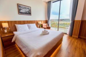 Letto o letti in una camera di Lotus Hotel Đà Lạt