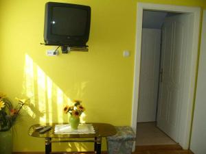 A television and/or entertainment centre at Caty Vendégház