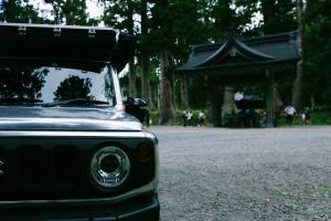 a car parked in front of a pagoda at FUUUN Camping Car in Fujinomiya